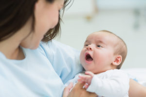 Mom's coos nourishes newborn neuron growth.