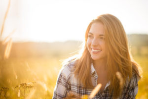 Woman enjoys afternoon sunshine because of ketamine the depression dragon slayer.