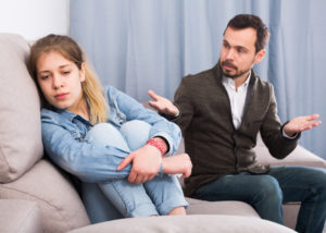 Depressed girl is unresponsive to nagging father -does depression runs families.