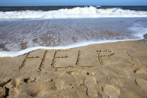 Message on the beach says HELP... anxiety treatment that doesn't make you sleepy.