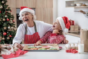 Christmas cheer and hanukkah happiness for grandma and grandchild together