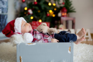 This baby sleeping in a box at Christmas is peaceful. But holidays with depressed family can be hard on everyone.