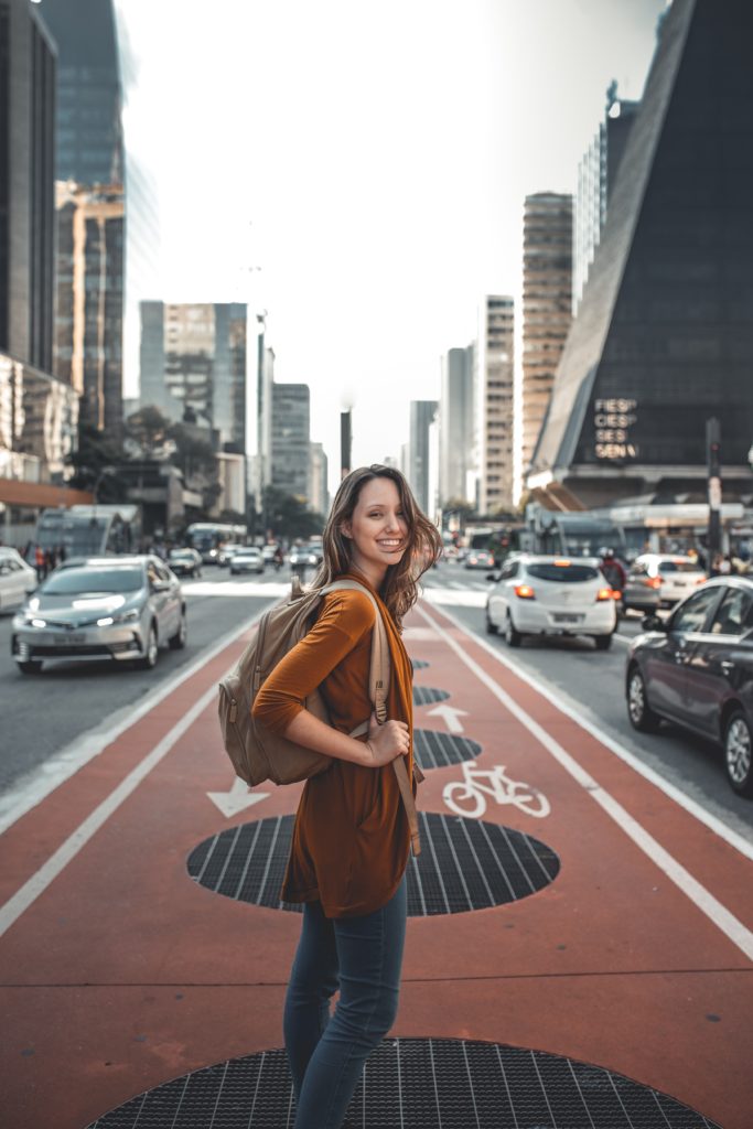 This young woman is upbeat because of the effect of fatty acids in her diet.