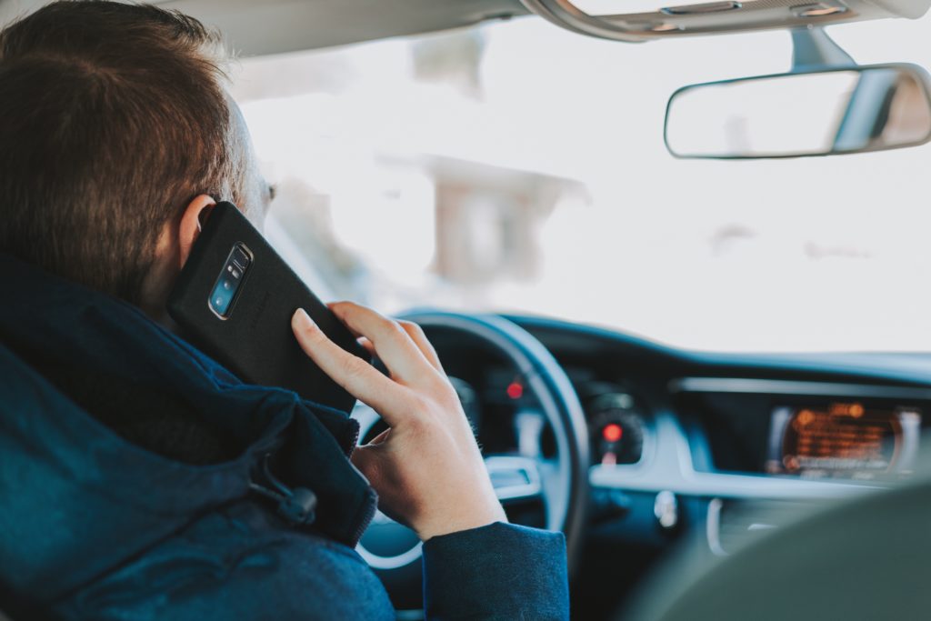 Man on a cell phone demonstrates one of the breakthroughs in Psychiatry of 2019.