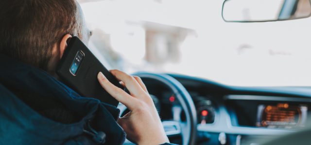 Man on a cell phone demonstrates one of the breakthroughs in Psychiatry of 2019.