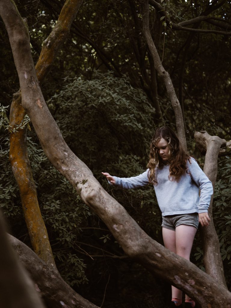 Fighting meanness, hatred and cyberbullying is painful, so this girl chooses to spend time alone in the woods.